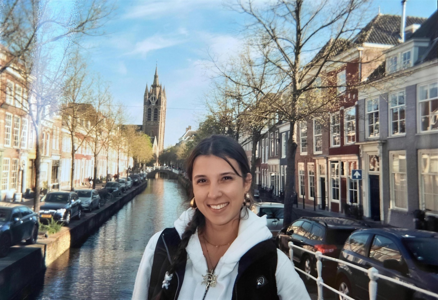 Sana Popovic beside a canal in Delft